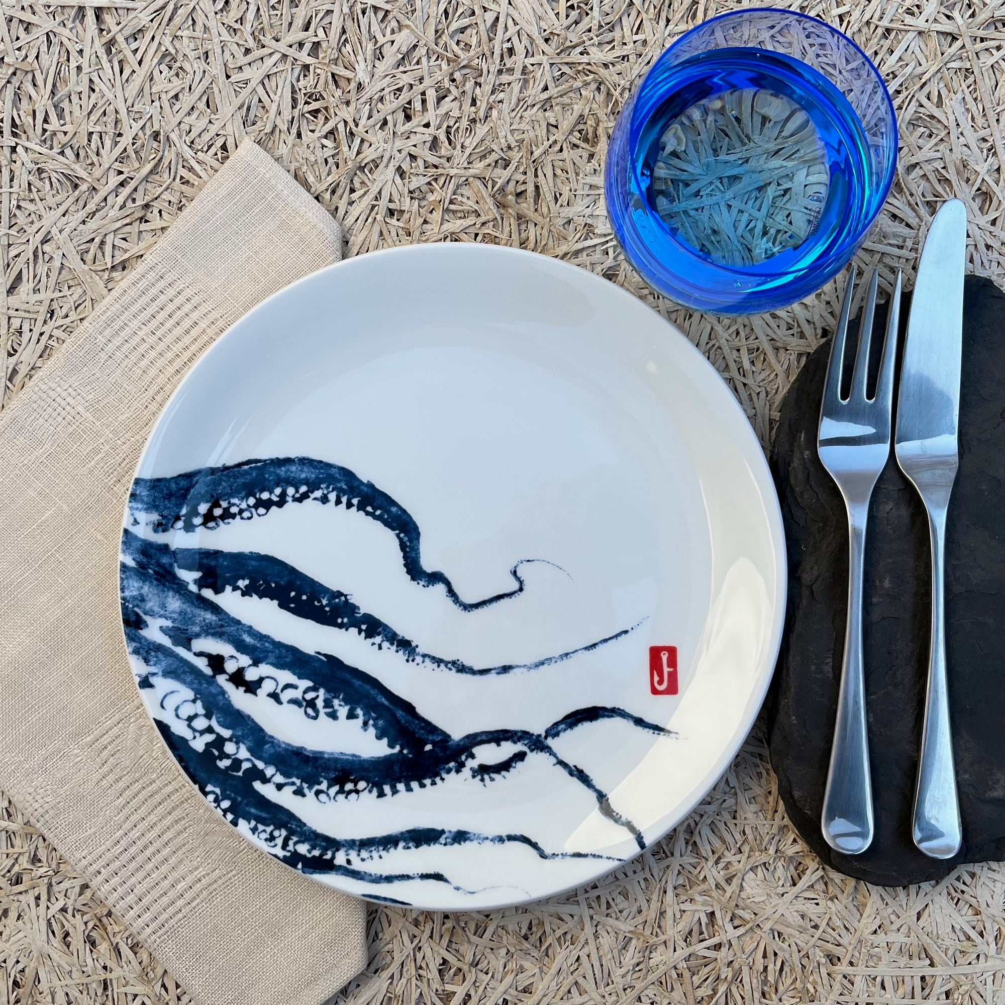 small plate blue octopus multi tentacle