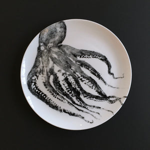 large plate with black octopus