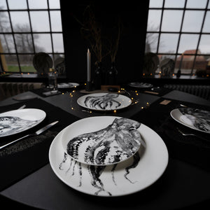 large plate with black octopus